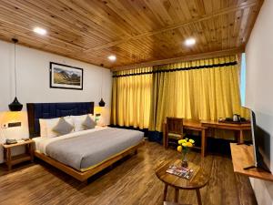 The Dunes Boutique Hotel客房内的一张或多张床位