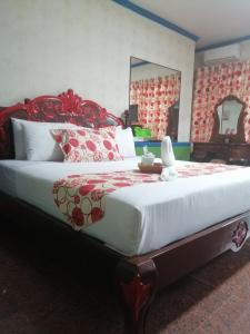 Letto o letti in una camera di Sang Yoo Mountain View Tagaytay Bed and Breakfast - Taal Lake View