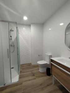 Łazienka w obiekcie Pensión Residencial Platas