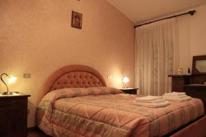 Llit o llits en una habitació de Il Focolare