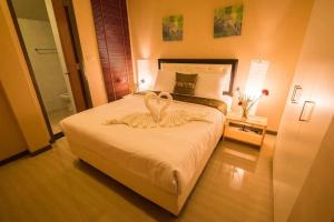 Postel nebo postele na pokoji v ubytování the time poolvilla3 + 16 fotografií