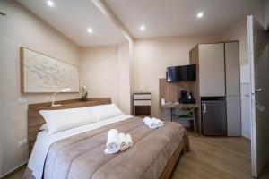 Кровать или кровати в номере ESPERIA B&B