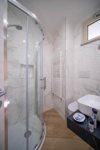 Ванная комната в ESPERIA B&B