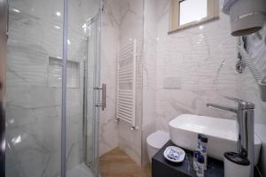 Ванная комната в ESPERIA B&B