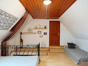 Voodi või voodid majutusasutuse MonAmi Art Apartman toas