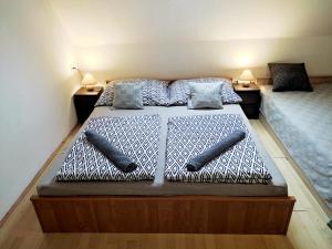 Voodi või voodid majutusasutuse MonAmi Art Apartman toas