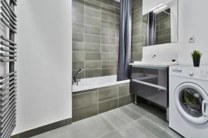 Kúpeľňa v ubytovaní Appartement Le Spacieux Lyonnais
