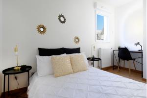 Posteľ alebo postele v izbe v ubytovaní Appartement Le Spacieux Lyonnais