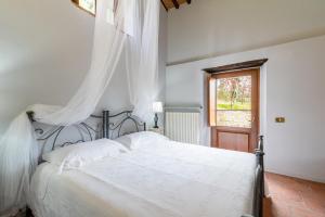 Postel nebo postele na pokoji v ubytování Selene - In Parulia Country House