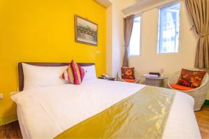 Katil atau katil-katil dalam bilik di Sweet B&B 幸福微甜民宿
