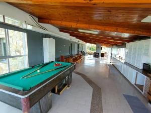 a billiard room with a pool table in a building at Casa Mosteiro in Bribes