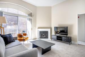 a living room with a couch and a flat screen tv at Century City 2BR w WD BBQ nr Mall LAX-334 in Los Angeles