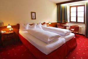 Voodi või voodid majutusasutuse Hotel Plankenhof B&B toas