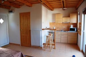 Kuchyň nebo kuchyňský kout v ubytování Maya Guesthouse