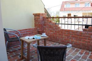 Balkón nebo terasa v ubytování Maya Guesthouse