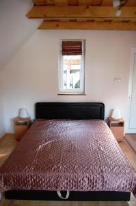 Postel nebo postele na pokoji v ubytování Maya Guesthouse