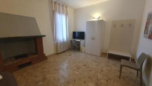TV a/nebo společenská místnost v ubytování Casa del Pozzo + 32 fotografií