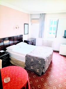 Postel nebo postele na pokoji v ubytování SPOR HOTEL