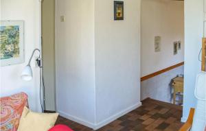 a room with a hallway with a white wall at Pimpernel2 in Bergen aan Zee