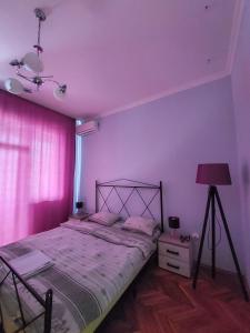 Voodi või voodid majutusasutuse Prishtina Center Hostel toas