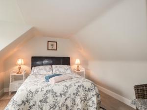 Postel nebo postele na pokoji v ubytování Peppermill Cottage
