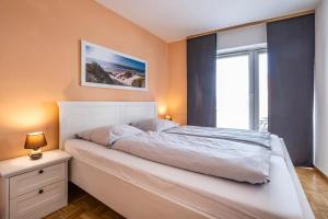 Postel nebo postele na pokoji v ubytování Haus Seemeile Wohnung 2 13