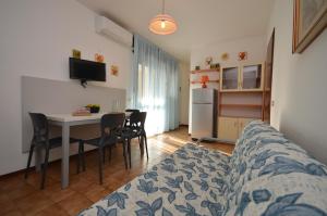 A bed or beds in a room at Appartamenti Alemagna