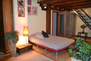 A bed or beds in a room at Castello 5888 C, Santa Marina, Calle Marcello, LOFT