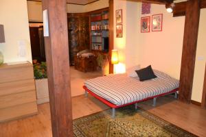A bed or beds in a room at Castello 5888 C, Santa Marina, Calle Marcello, LOFT