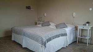 Katil atau katil-katil dalam bilik di Bed & Breakfast Vinkille