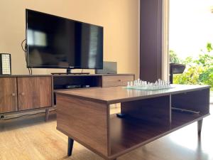 TV a/nebo společenská místnost v ubytování Lochry Guest Suite