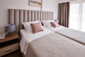 Letto o letti in una camera di Magnolia Place
