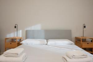A bed or beds in a room at [Cozy apartment] Treviso 31