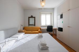 A bed or beds in a room at [Cozy apartment] Treviso 31