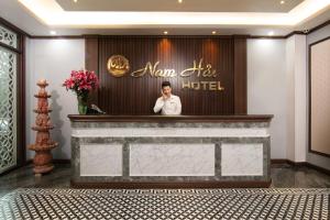 Nam Hai Hotel tesisinde lobi veya resepsiyon alanı