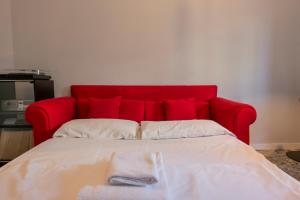 A bed or beds in a room at [Cozy apartment] Treviso 31