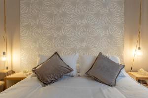 A bed or beds in a room at B&B Massimocentro