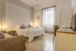 A bed or beds in a room at B&B Massimocentro