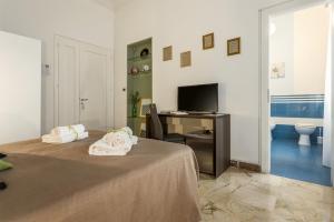 A bed or beds in a room at B&B Massimocentro