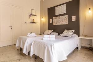 A bed or beds in a room at B&B Massimocentro