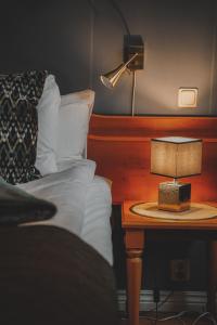 Voodi või voodid majutusasutuse Mojo Hotell toas