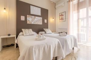 A bed or beds in a room at B&B Massimocentro