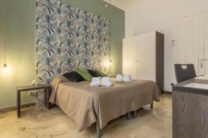 A bed or beds in a room at B&B Massimocentro