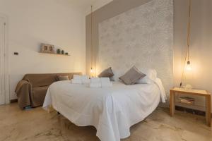 A bed or beds in a room at B&B Massimocentro