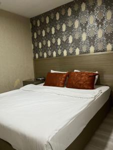 Katil atau katil-katil dalam bilik di Metro Otel