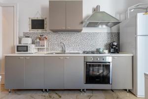 A kitchen or kitchenette at B&B Massimocentro