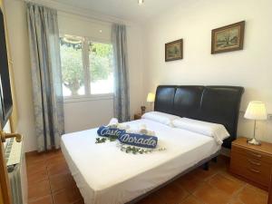 Posteľ alebo postele v izbe v ubytovaní Arenda Mara villa con piscina privada jardín