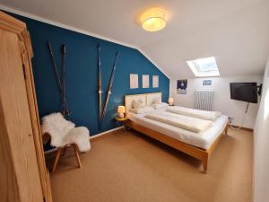 Postel nebo postele na pokoji v ubytování AlpenHorizont