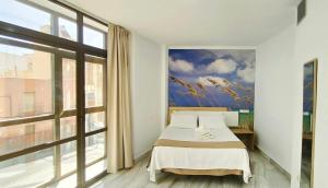 Posteľ alebo postele v izbe v ubytovaní Hotel Sol Almería