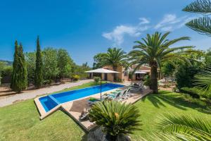 an image of a villa with a swimming pool at Casa Angela in Capdepera